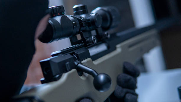 istock close-up shot of a sniper rifle 2106100287