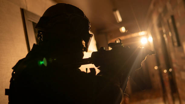 istock A special forces soldier with an assault rifle in his hands 2106100825