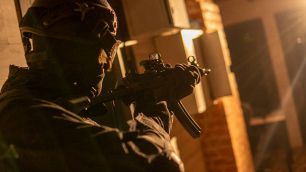 istock An assault rifle is held by a special forces soldier 2106101331