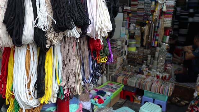 Colorful Tassels in Fabric Store