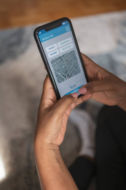 istock African woman using cellphone order online shopping product and paying bills with banking app with transaction successful 2106124708