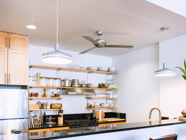 istock Contemporary loft apartment featuring a thoroughly equipped modern kitchen. 2106146317