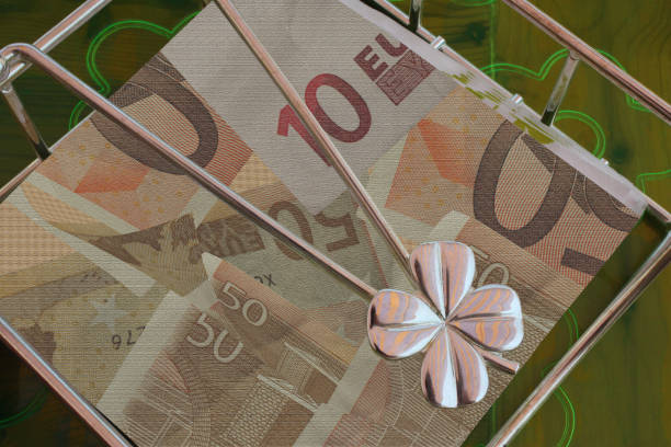 Indian currency notes held in a fan-like arrangement, representing financial growth, wealth, and monetary concepts with detailed features of the banknotes.