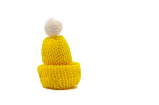 Small Woolen Winter Season Hat Isolated on White Background with Copy Space for Texts Writing.