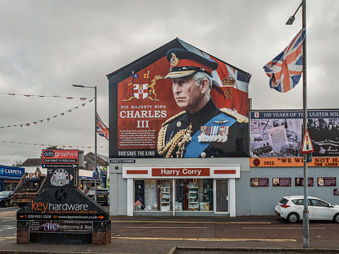 Belfast, Northern Ireland UK: September 20th of 2023. Portrait of the king of United Kingdom on top of a store in a street in Shankill road Belfast