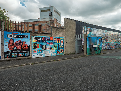 Belfast, Northern Ireland UK: September 20th of 2023. Gate that separated communities in Belfast during the Trouble years. Nowadays those gates are open and street art covers those barriers that separated the communities of this city.