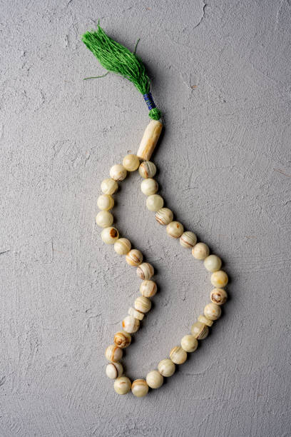 istock Rosary on gray concrete background 2106265489