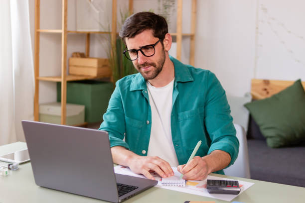 istock Businessman working from home office 2106271725