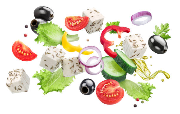 istock Greek salad ingredients flying in air. File contains clipping paths. 2106306842