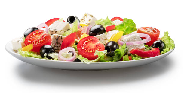 istock Greek salad on white plate isolated on white background. File contains clipping path. 2106306854