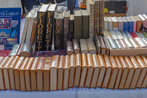 Nice, France - January 29, 2018: Second Hand Books for Sale at Brocante Antique Market Cours Saleya Winter Day.