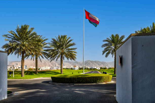 istock The Omani flag outside a building in Muscat 2106312155