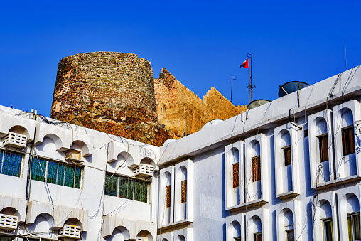 The watchtower of  the old souq (Mutrah Souq) in Muscat photographed at dusk, Oman