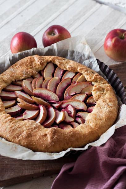 istock Sweet galette with apples and elder berries. 2106320488