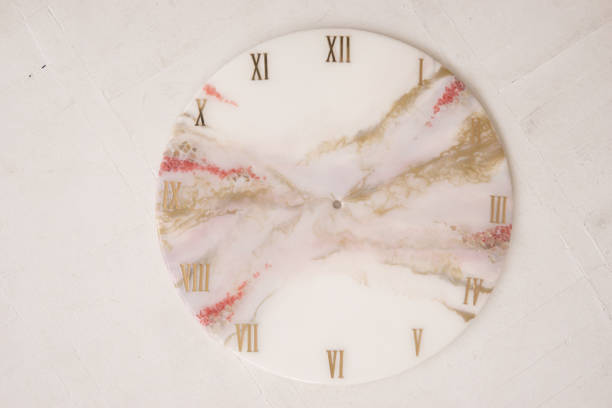 istock Handmade interior clocks made of epoxy resin. An interior item. 2106350116