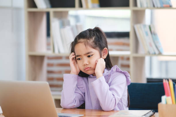 istock Young Girl Bored with Online Learning 2106444869