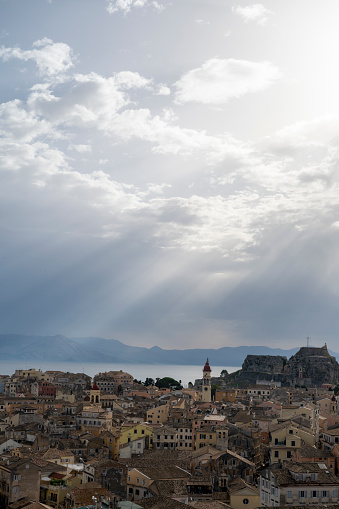 Aerial view of sunrise over city and bay in distance, Corfu