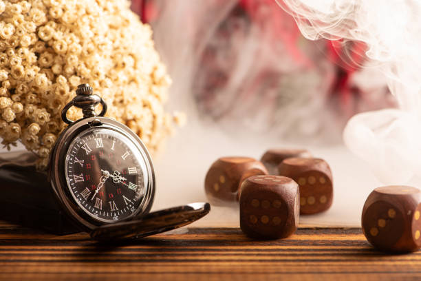 istock Antique clock and accessories, old and beautiful clock and accessories on rustic wood and dark background, selective focus. 2106549892