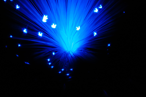 The abstract imagery make by fibre optic lamps with a star shaped bokeh filter