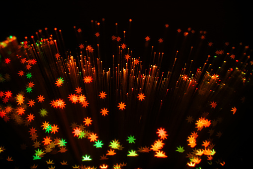 The abstract imagery make by fibre optic lamps with a star shaped bokeh filter