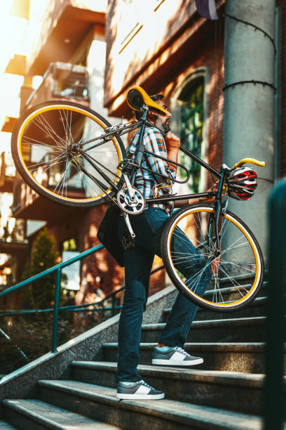 istock Casual businessman going to work by bicycle 2106552799