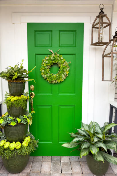 istock Spring front porch and green door 2106565384