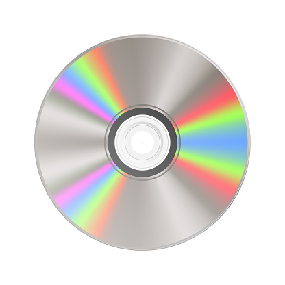 A CD optical media of a plastic disc with a hole in the center with light diffraction.