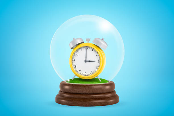3d close-up rendering of yellow retro alarm clock standing inside glass ball globe on light-blue background.