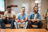 Friends Enjoying Gaming Together at Home