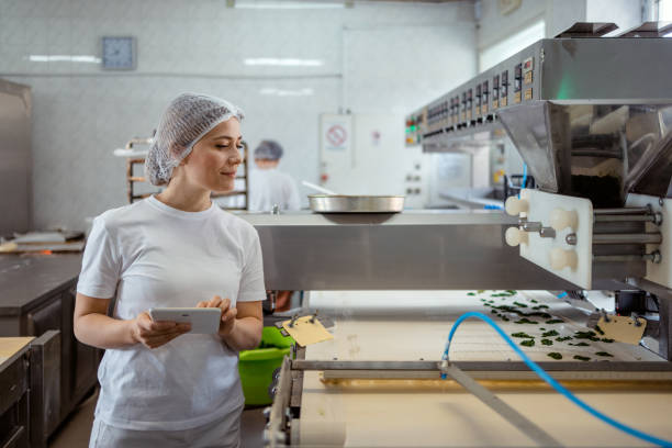 istock Woman Using a Digital Tablet to Manage Her Bakery 2106695972