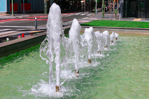 Fountains in the city of Las Palmas, Canary Islands Spain. Urban street with splashing water