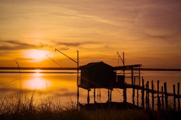 istock sunset at Pialassa Baiona near Marina Romean (Italy) 2106758241