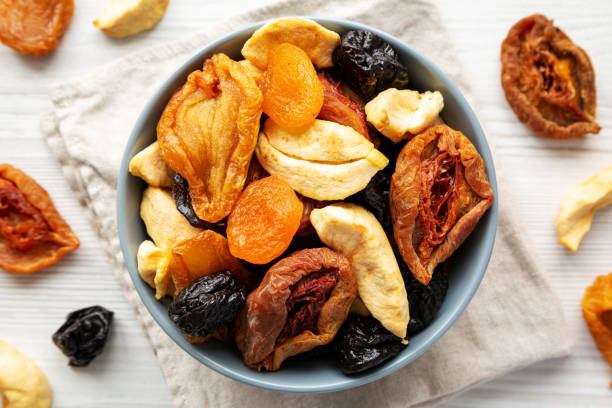 istock Organic healthy fruit mix in a bowl, top view. Flat lay, overhead, from above. 2106810352