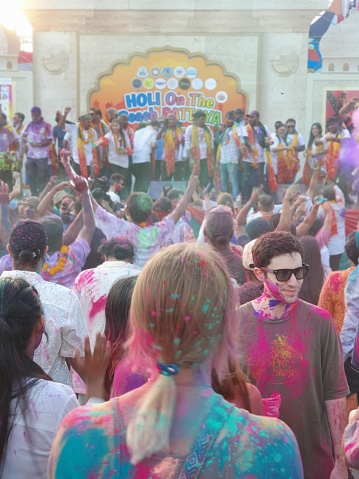 Pattaya, Thailand - March 23, 2024: People enjoy Indian Holi festival in Thailand, colourful powders it is  traditional festival of Indian religion,  It is considered one of the national festivals enjoyed by Indians as well as tourists around the world.