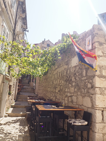 In August 2021, tourists could walk in the streets of the old Town of Korcula in Dalmatia, Croatia and enjoy lots of bars and restaurants