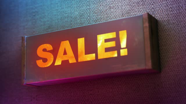 Electronic display showing red light message SALE!