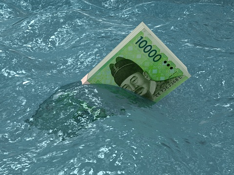 South Korean won money finance crisis floating on water
