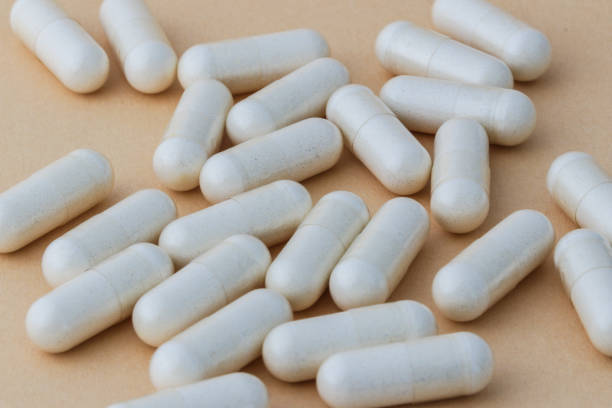 istock A stack of supplement capsules, dietary supplements, vitamin tablet, nutritional supplements in capsule form. 2106863259