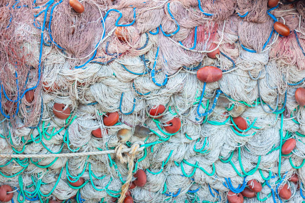 istock Large pile of fishing nets with floats. 2106870820