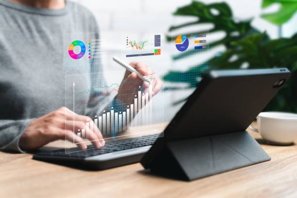 istock Digital marketing data management concept, Businesswoman use the tablets to plan work marketing and analysis charts strategically for sustainable development and financial and investment competition 2106881521