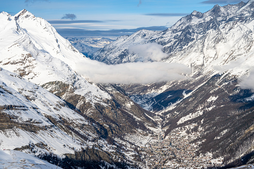 Aerial view of snow covered, Swiss mountain village in winter