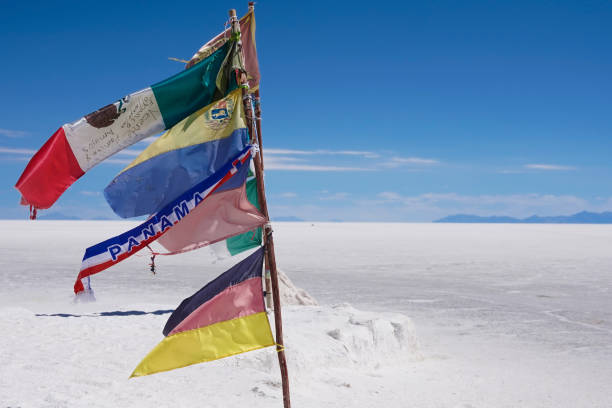 Flags flying  in the wind in Salar de Uyuni Bolivia