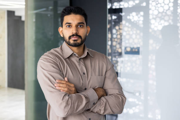 istock Confident business professional posing in a modern office environment 2106932099