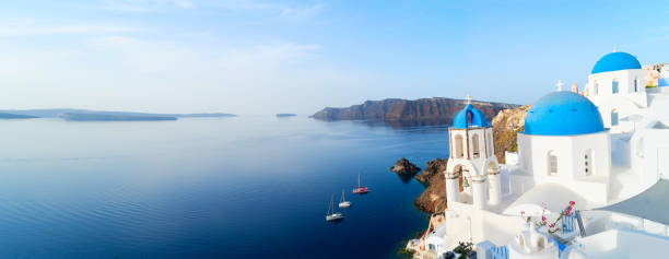 istock white belfries Santorini island, Greece 2106945304