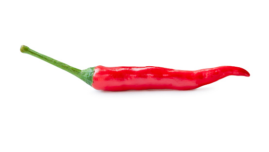 Side view of single fresh red chili pepper is isolated on white background with clipping path.