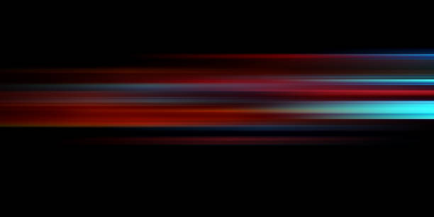 istock Light and stripes moving fast over dark background 2107004760