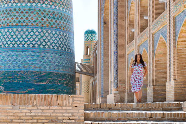 a lady walking around the old city, Khiva, Uzbekistan