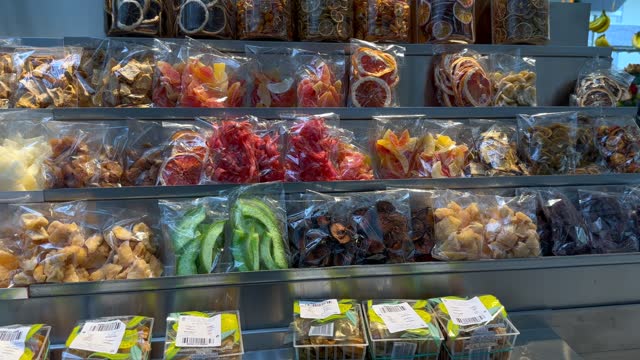 Counter with colorful dry fruits packs