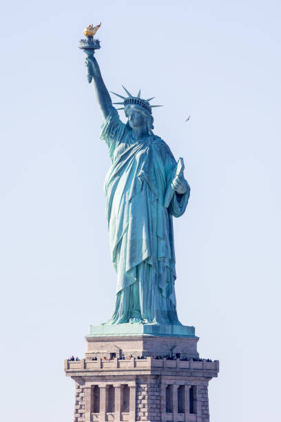 istock Statue of Liberty on a sunny day 2107058714