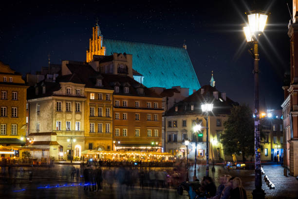 Holidays in Poland - Castle Square Warsaw's Old Town by night